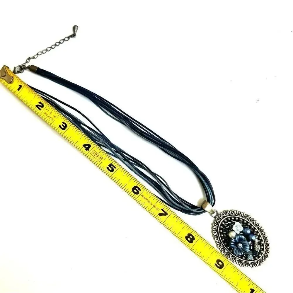 Blue floral beaded pendant necklace on multi cord
